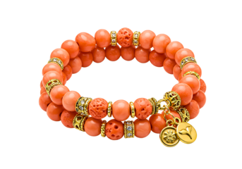 Stack of coral gemstone bracelets with gold accents isolated on transparent background