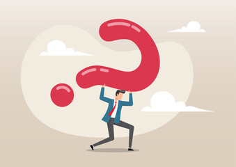 A businessman struggling as he carries an enormous, heavy red question mark 