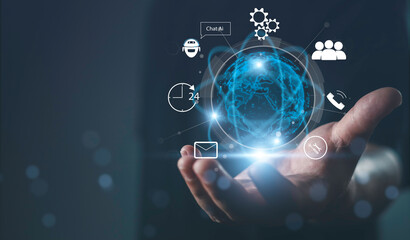 Hand holding digital globe with chatbot, gear, mail, and support icons, representing AI customer service, global communication, automation, and 24/7 digital support.