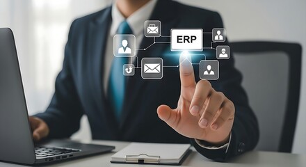 Businessman interacts with a digital ERP interface showcasing a modern management system and advanced technology.