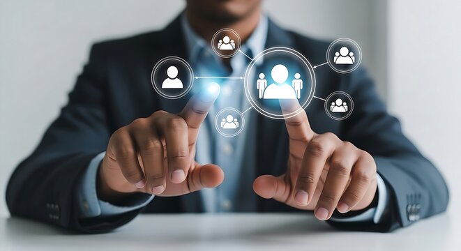 Business professional touching digital network icon, representing human resources and technology interface
