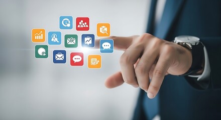 Man touches colorful app icons in air, interacting with modern technology and data for business solutions.
