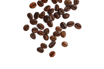 Roasted scattered coffee beans flat lay top view on white background cutout file. Mockup template for artwork. Wallpaper banner