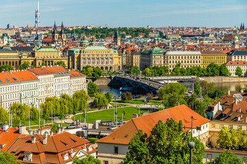 A view from the castle complex over the Vltava River towards the Charles bridge in Prague in...