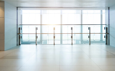 Office building corridor with glass railing