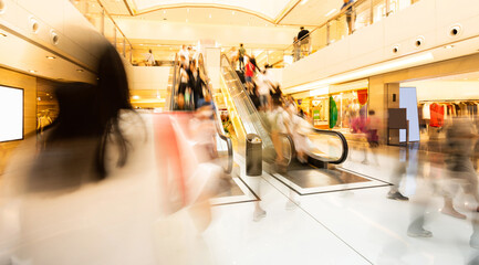 Blur of people on shopping mall