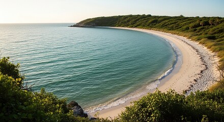 Obraz premium The tranquil beach boasts stunning turquoise waters and a beautiful white sand shore.