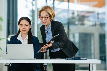 Professional supervisor oversees mentoring and development of company trainee