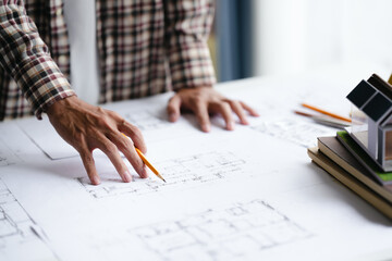 Engineer architect planning on blueprints construction