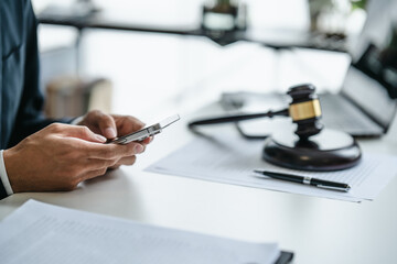 Justice lawyer considering a legal documents in courtroom