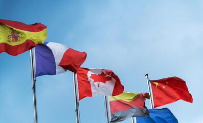 Flags of different countries in the sky