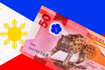 50 Piso Philippines, New Polymer Note 2025 with Visayan Leopard. Philippine money on a background...