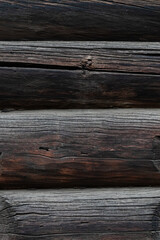 Obraz premium The texture of weathered wooden planks showing a rustic background, close up view.