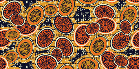 African ethnic traditional orange pattern. seamless beautiful Kitenge, chitenge style. fashion design in colorful. Geometric circle abstract motif. Floral Ankara prints, African wax prints.