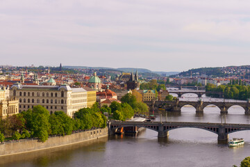 Panoramic view of Prague with Vltava River and historic bridges
