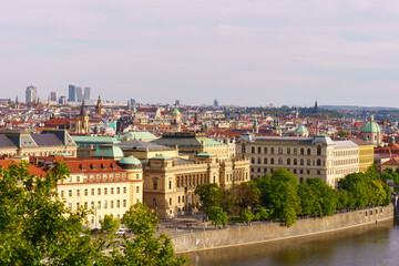 Fototapeta premium Panoramic view of Prague with Vltava River and historic bridges