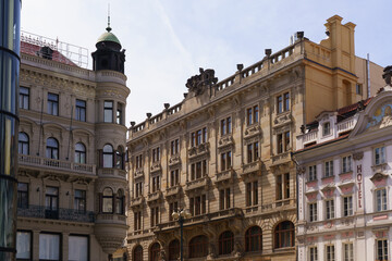 Fototapeta premium Eclectic historic buildings with rich facades in Prague’s city center