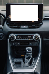 Fototapeta premium A close-up of the gearbox of a modern, new car. Concept of stylish design, shopping, and car parts.