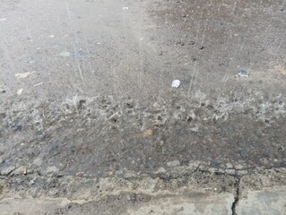 Rain-Soaked Street: Abstract Textures of Urban Downpour