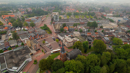Aerial of the old town of the city Veendam in the Netherlands on an overcast day in summer	
