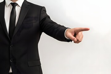 professional man in suit pointing to empty space beside him, isolated on white, ad concept 
