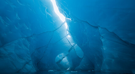 Melting Arctic Ice Inside a Vibrant Blue Ice Cave