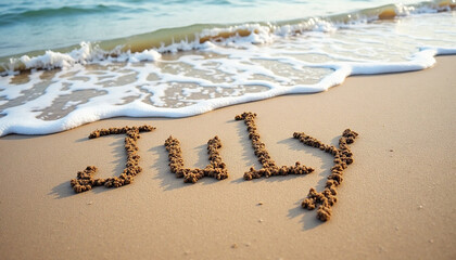 July Text Formed from Sand on a Tropical Beach Shoreline by Approaching Wave