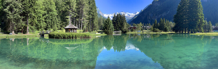 reflection in water in lake in gressoney italy