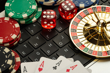 A stock photo showcasing gambling culture, featuring casino icons like playing cards poker,...
