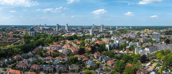 Aerial view of Eindhoven, Netherlands, showcasing skyscrapers like Vesteda Tower, traditional...