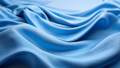 Fototapeta premium flowing fabric resembling soft blue hills close up of light blue textile folds creating a wavy abstract landscape with subtle texture and gentle lighting