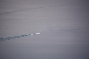 Aerial View of a Boat on Calm Water