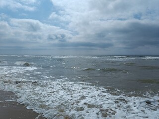 Waves on the sandy beach