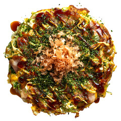A top down view of okonomiyaki with bonito flakes and green seasoning on a black background