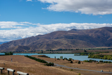Tranquil Landscape with Hills and Lake