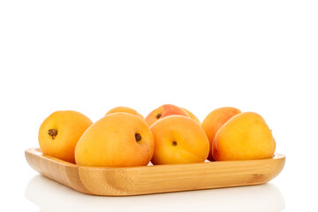 Sweet organic apricots isolated on white background, close-up.
