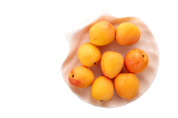 Sweet organic apricots isolated on white background, close-up.