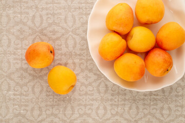 Sweet organic apricots, close-up, top view.