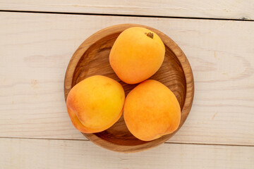 Sweet organic apricots, close-up, top view.