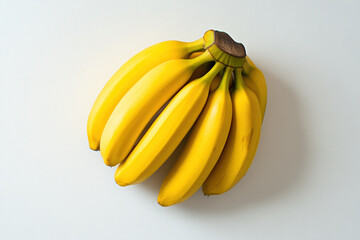 Bright yellow banana bunch with a smooth peel, perfectly arranged on a white background. 