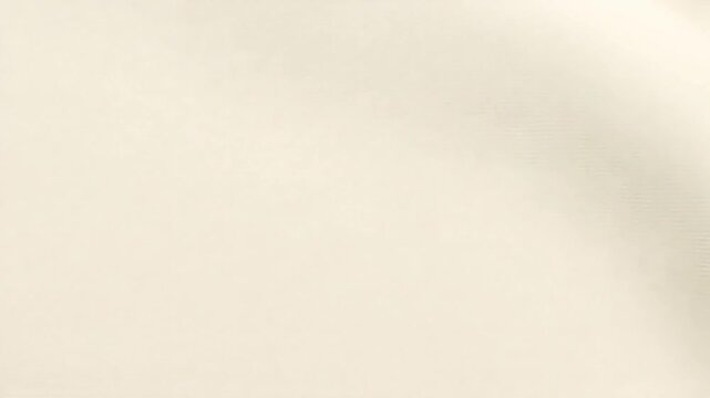 Ivory cream background with soft, subtle motion, suitable for adding text or graphics in design projects.