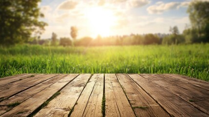A wooden table with a grassy field in the background under a clear sky with scattered clouds.