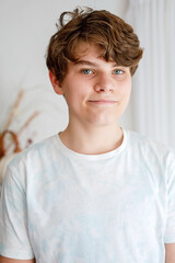 Portrait of teenager school kid boy. Beautiful happy child looking at the camera. Schoolboy...