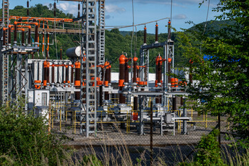 High voltage switch. High voltage electrical transformer substation. Power station. Power line.