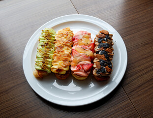 Assorted Gourmet Eclairs from the Sunday market.
