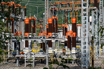 High voltage switch. High voltage electrical transformer substation. Power station. Power line.
