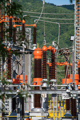 High voltage switch. High voltage electrical transformer substation. Power station. Power line.
