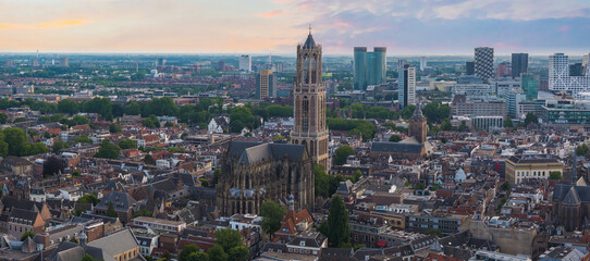 Aerial view of Utrecht, Netherlands, showcasing the Dom Tower, historic architecture, modern high...
