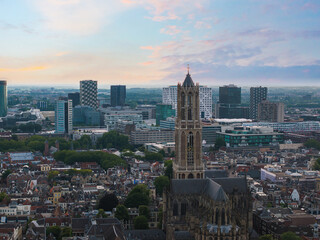 Aerial view of Utrecht, Netherlands, showcasing the Dom Tower, historic architecture, modern...