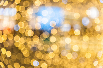 Background of beautiful golden bokeh lights
